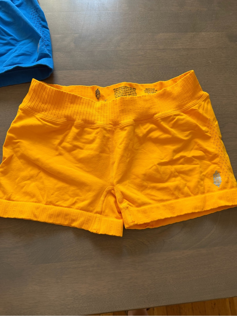 FP Movement Good Karma Micro shorts Orange size M/L.